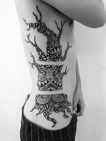 12 Awesome Tribal Tree Tattoos  Only Tribal