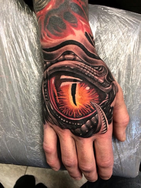Realistic Hand Eye Tattoo by Drew Apicture