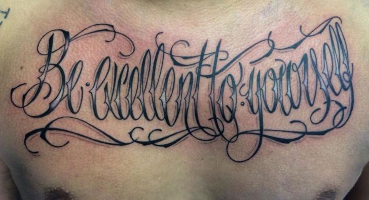 Chest Lettering Tattoo by Tattoo Nero