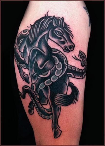 Traditional Cowboy Riding Horse Tattoo Idea